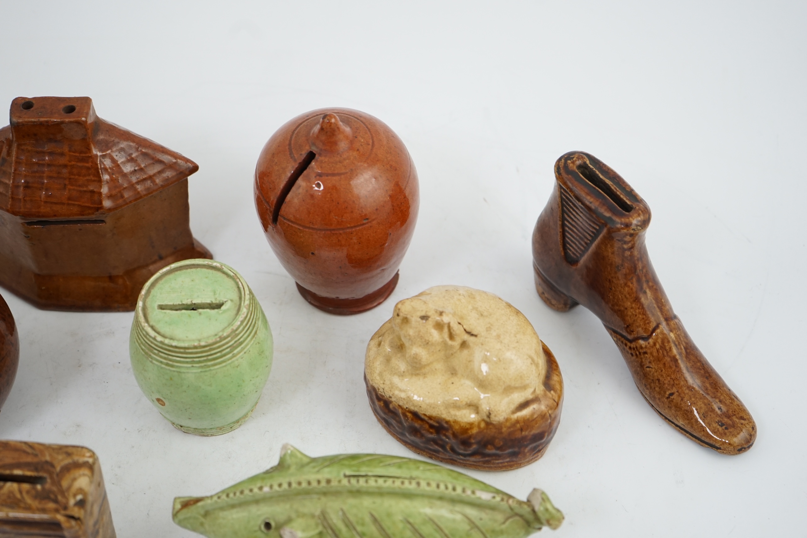 A collection of ten 19th century Dutch and British pottery money boxes